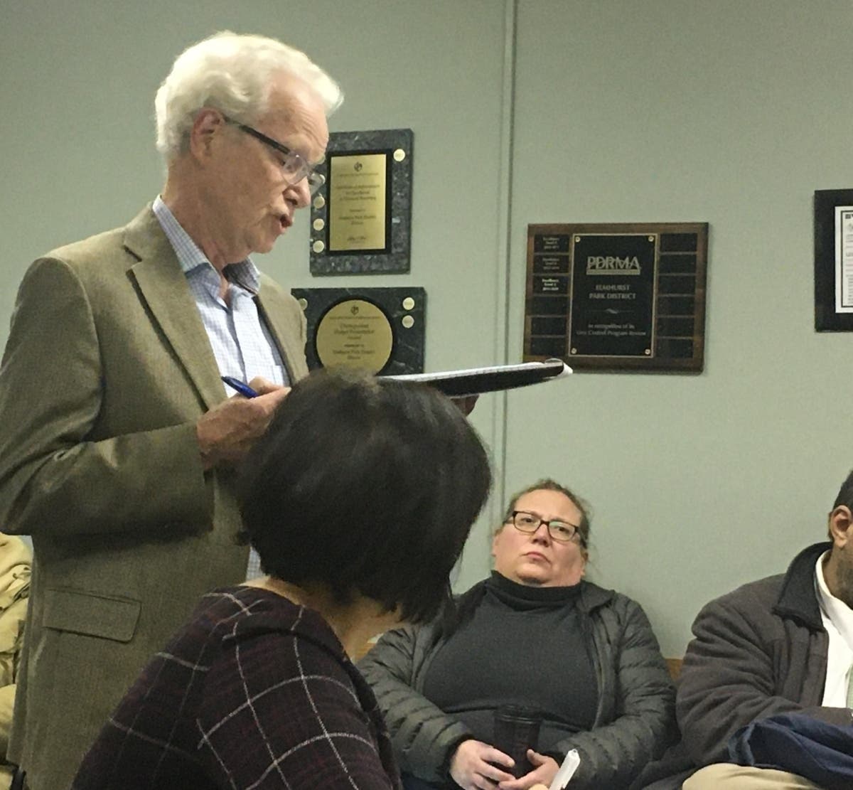 Elmhurst resident William MacDonald speaks out against a $105 million plan for park improvements. He said his property taxes have risen 110 percent in the two decades since he bought his home. 