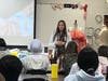 Local fashion designer Abbie Ross speaks to the fashion merchandising and design class at Hinsdale Central High School. 