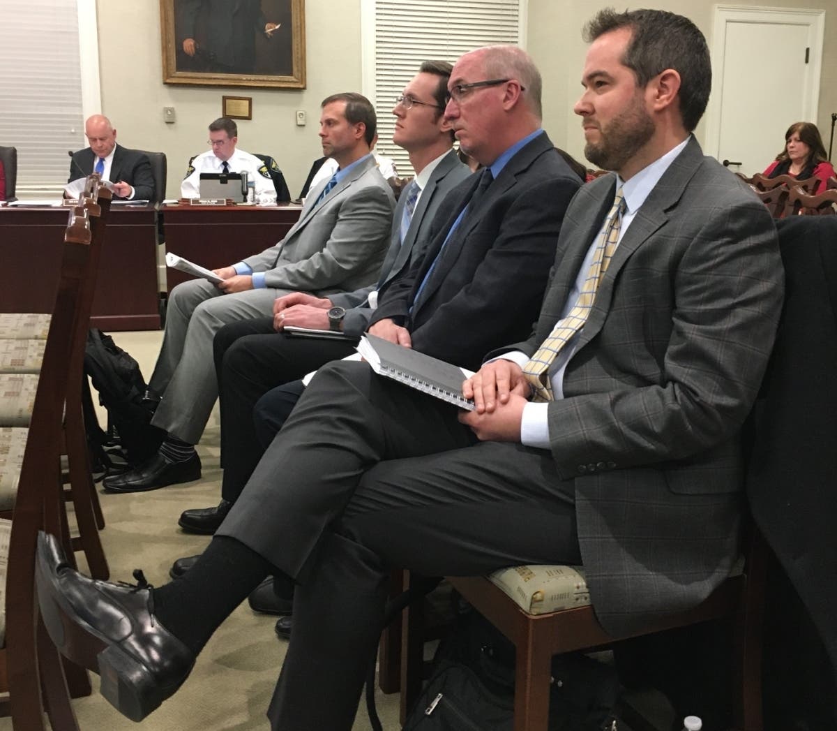 David Erickson, a vice president of Ryan Companies, and other representatives of the firm attend the meeting of the Hinsdale Village Board on Tuesday night. They proposed a 262-unit senior housing complex in Hinsdale. 
