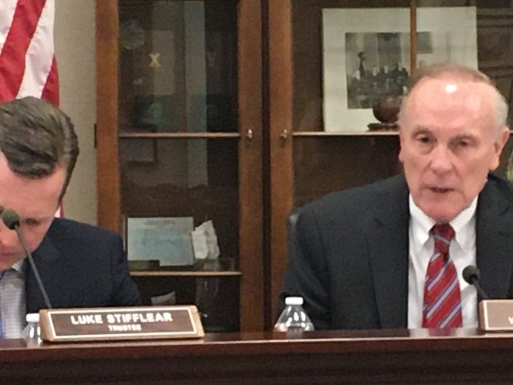 Hinsdale Village President Tom Cauley expressed support for an administration proposal to offer free three-hour parking in downtown.  Trustee Luke Stifflear is to the left. 