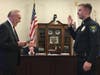 James Litrenta is sworn in by Village President Tom Cauley at Tuesday's Village Board meeting. 