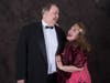 Big Louie (Rhys Read) enjoys some sweet talk from Delilah (Grace Martinez).