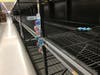 Walmart reserves a whole side of an aisle for toilet paper. It was a ghost town Monday. 
