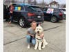 Even a dog got into the spirit for 2-year-old Clara Thommes' birthday. With the dog is Paige Quinlan of Chicago. 