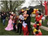 Mickey Mouse participated in the parade Monday on Darien Club Drive. 