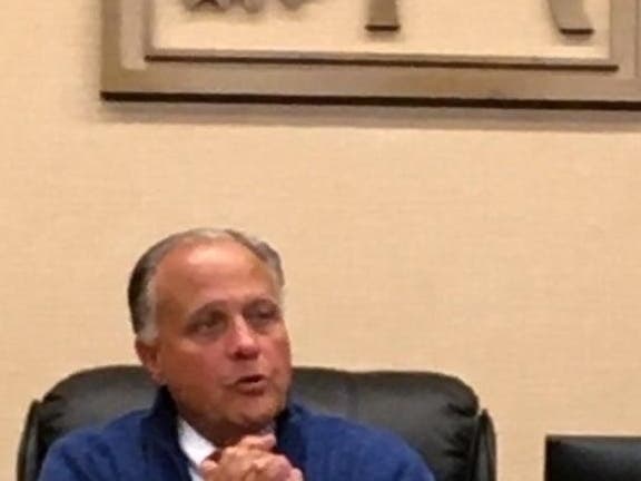 Burr Ridge Mayor Gary Grasso said in Tuesday's daily bulletin that earlier comment was "too strong."