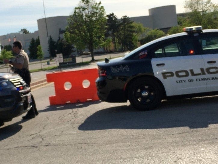 Officers are on guard outside Oakbrook Center, which was closed Sunday afternoon. Oak Brook officials said many rumors on social media about the center were false. 