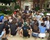 Hundreds kneel in silence for nine minutes in front of La Grange Village Hall on Wednesday. The nine minutes represented the amount of time a Minneapolis officer kneeled on George Floyd's neck before he died. 