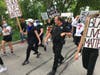 Patrick Fulla, a La Grange police officer, walked near the front of the march at times to ask organizers where the march was headed. 
