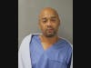 Brandon Waters, 39, of Chicago, was arrested Friday on charges of armed robbery in Riverside and Berwyn. 