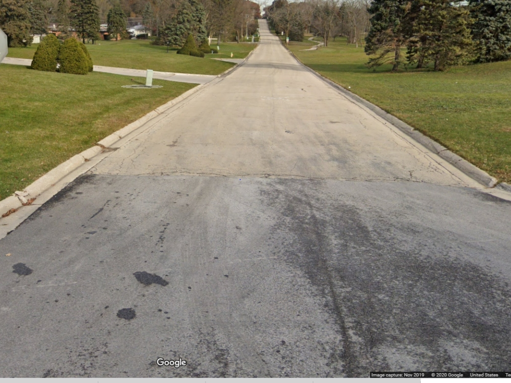 This is Adams Street where it connects with Ogden Avenue. On the left side is the site of a proposed senior development. On the right is where a single-family housing project is planned. 