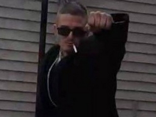 This unknown man is believed to have used a Nazi-type gesture after vandalizing a Chicago church, according to the FBI.
