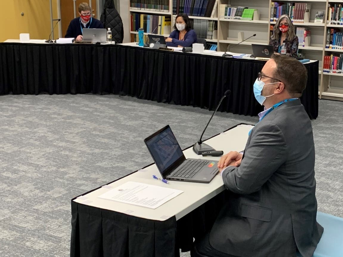 Chris Covino, assistant superintendent of Hinsdale High School District 86, speaks to the school board Thursday about the program of studies. The board unanimously approved the proposal. 