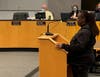 Elmhurst resident Nicole Virgil tells the city's Zoning and Planning Commission on Tuesday that the community would rise up as needed if the commission recommended a smaller size for hoop houses. 