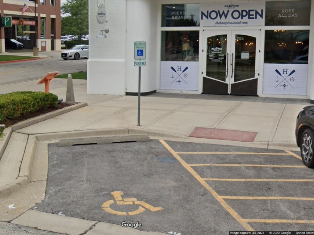 An assistant manager at Burr Ridge's Hampton Social parked in a handicapped spot in front of the restaurant in October. He justified it by saying he was doing a cash drop. A hearing officer rejected that argument. 