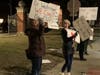 A couple of dozen teacher's aides at Lyons Township High School demonstrate for higher pay before Tuesday's school board meeting. 