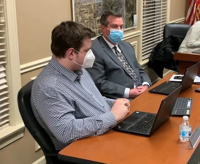 Clarendon Hills Village Manager Kevin Barr, right, is next to Assistant Village Manager Zach Creer last month at a Village Board meeting. 