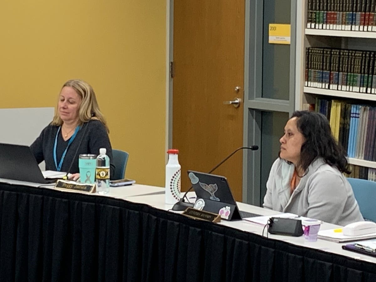 Cynthia Hanson (right), a Hinsdale High School District 86 board member, suggests the board consider a boundary change between Central and South high schools. Member Peggy James said she was against such a move "at this time."