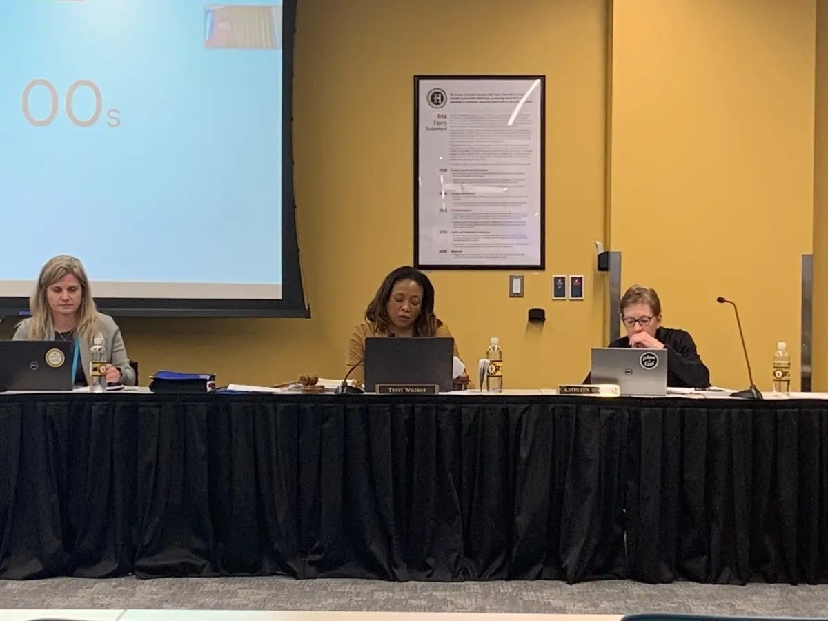 Tammy Prentiss (left), superintendent of Hinsdale High School District 86, is at a school board meeting late last month. Next to her are board President Terri Walker (middle) and Vice President Kathleen Hirsman.