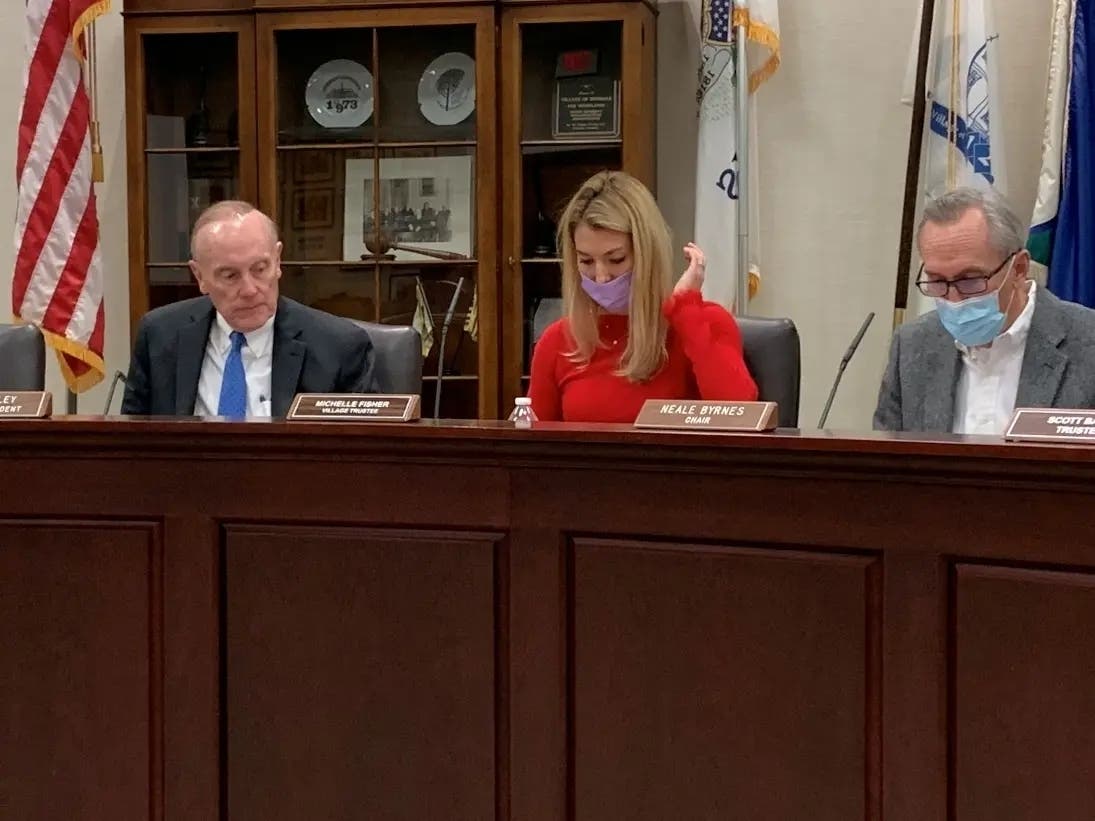 Hinsdale Village President Tom Cauley (left) last week announced that developer Ryan Companies withdrew its latest proposal for senior housing at Ogden Avenue and Adams Street. Next to him are trustees Michelle Fisher and Neale Byrnes.