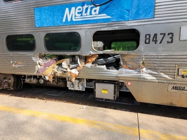 Christina Lopez, 72, of Downers Grove, died in the train crash Wednesday in Clarendon Hills, her family said. This photo shows damage to the train.