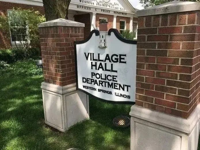 Daniel Albrecht, Western Springs' former deputy police chief, was suspended from his job weeks before he retired, according to village records. He was ordered to stay off village property without the police chief's written permission. 