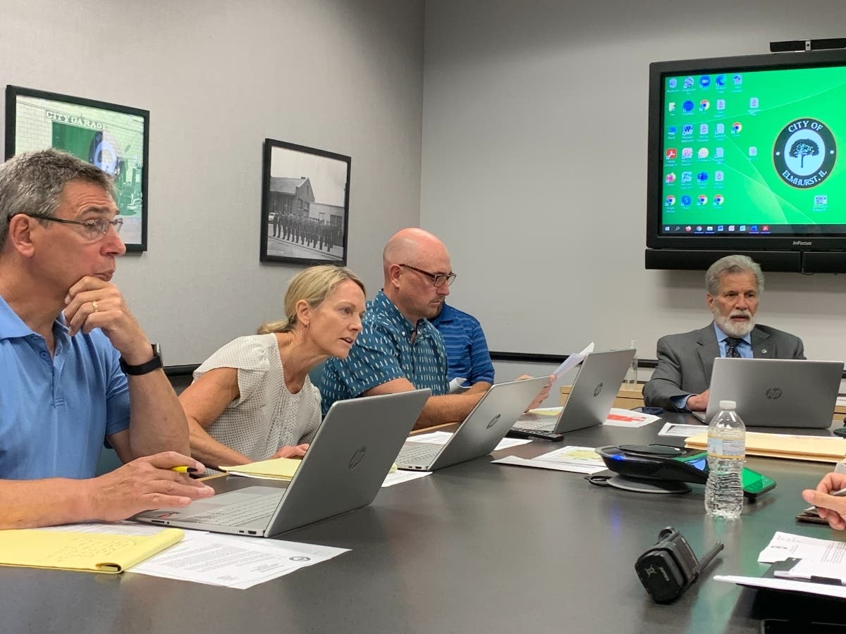 Elmhurst aldermen (from left) James Nudera, Marti Deuter and Jacob Hill and Mayor Scott Levin on Monday attend a meeting of the council's Public Safety Committee. 