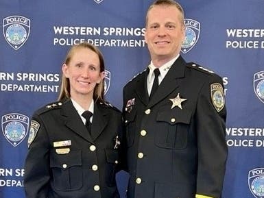 Ashlee Niezgoda was named deputy police chief for Western Springs on Monday. Next to her is Chief Brian Budds. 