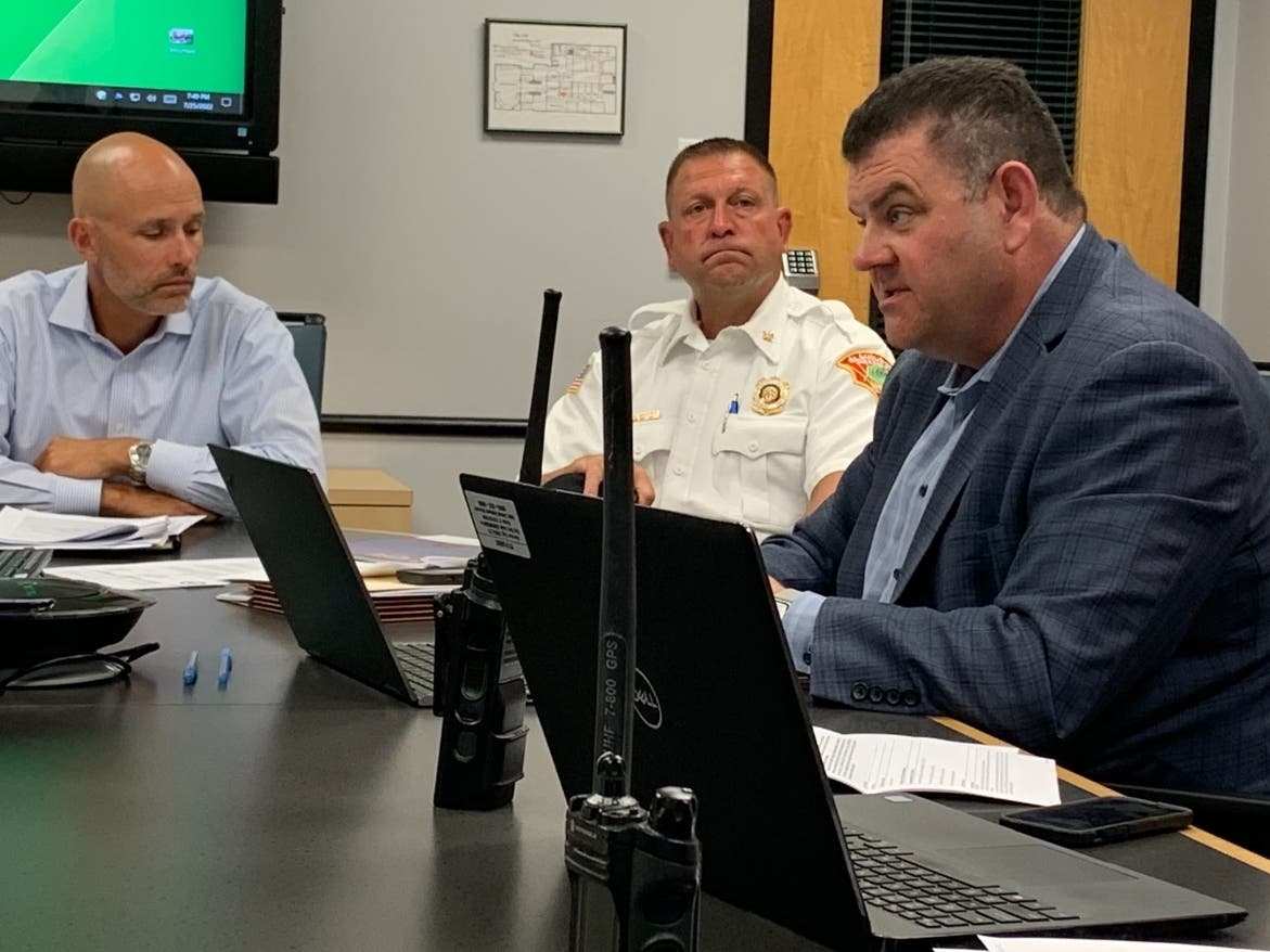 Mike Tillman (foreground), vice president of Elmhurst-based Superior Ambulance, makes the case for new contract terms to a City Council committee Monday. Next to him are Elmhurst City Manager Jim Grabowski (left) and acting Fire Chief Bill Anaszewicz.