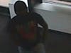 This suspect carried a black handgun during a robbery Monday at the AT&T store in Elmhurst, police said. 