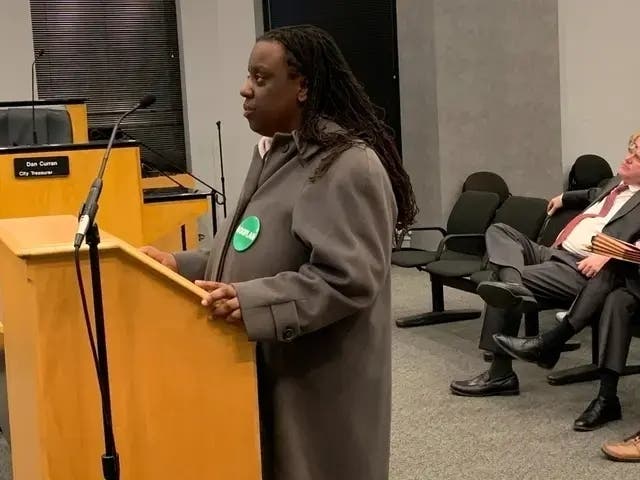 Elmhurst resident Nicole Virgil speaks at a city meeting earlier this year in support of allowing hoop houses. 