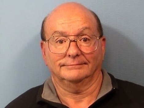 Peter Barkoulies, 68, of Addison, was charged with burglary to a place of worship, a felony, authorities said. His bond was set at $100,000.
