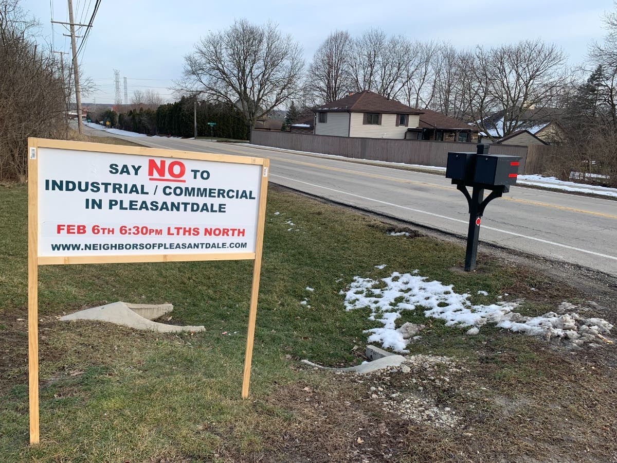 Opposition is building to Lyons Township High School's plan for its land in Willow Springs. School board members have stayed publicly quiet for a month. 