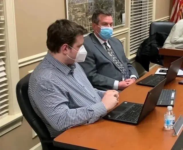Clarendon Hills Village Manager Kevin Barr (right) and Assistant Village Manager Zach Creer attend a Village Board meeting in early 2022. 