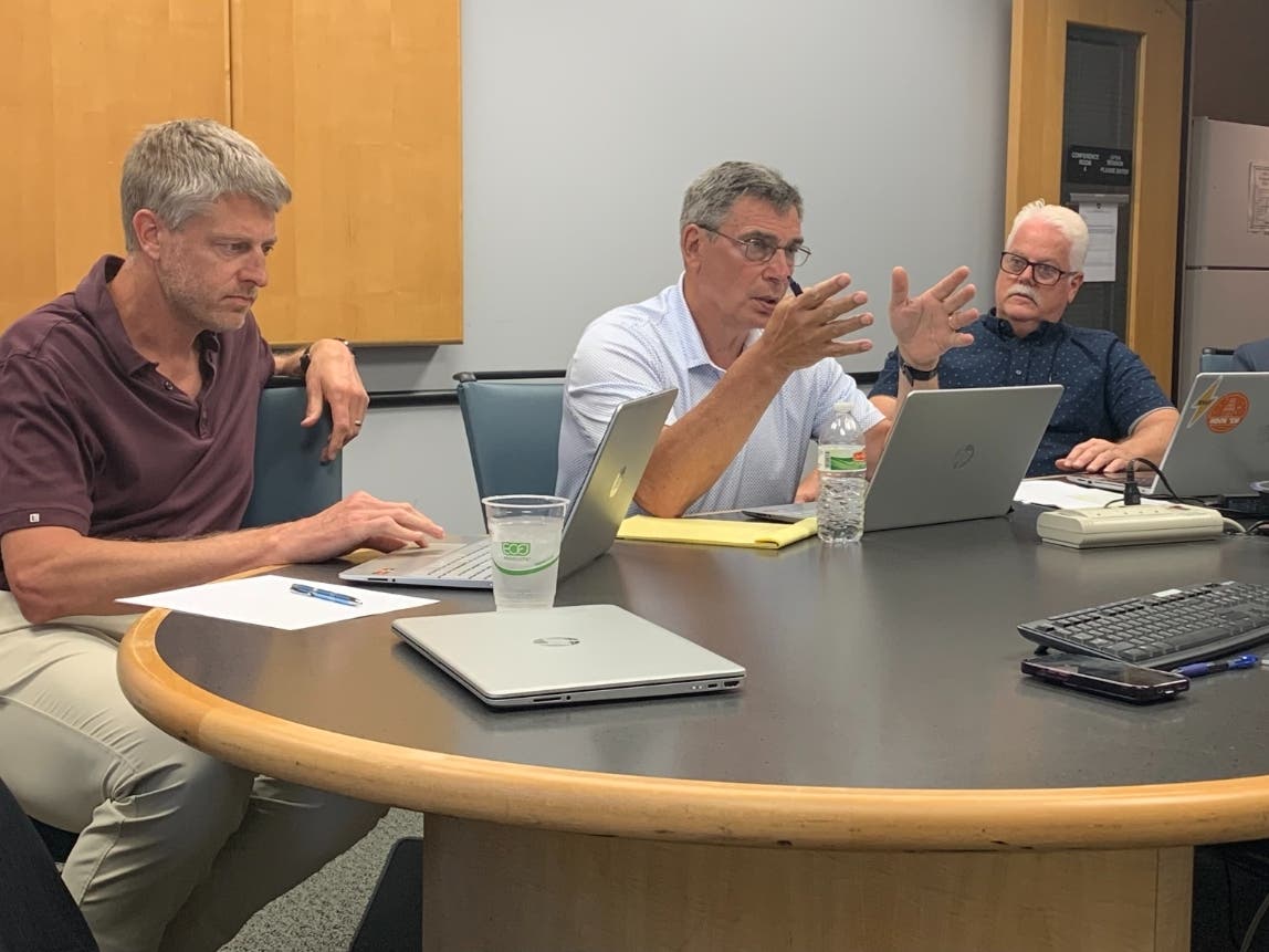 Alderman James Nudera (center) speaks about tax increases Monday during a meeting of the City Council's Finance Committee. Next to him are aldermen Chris Jensen (left) and Rex Irby.