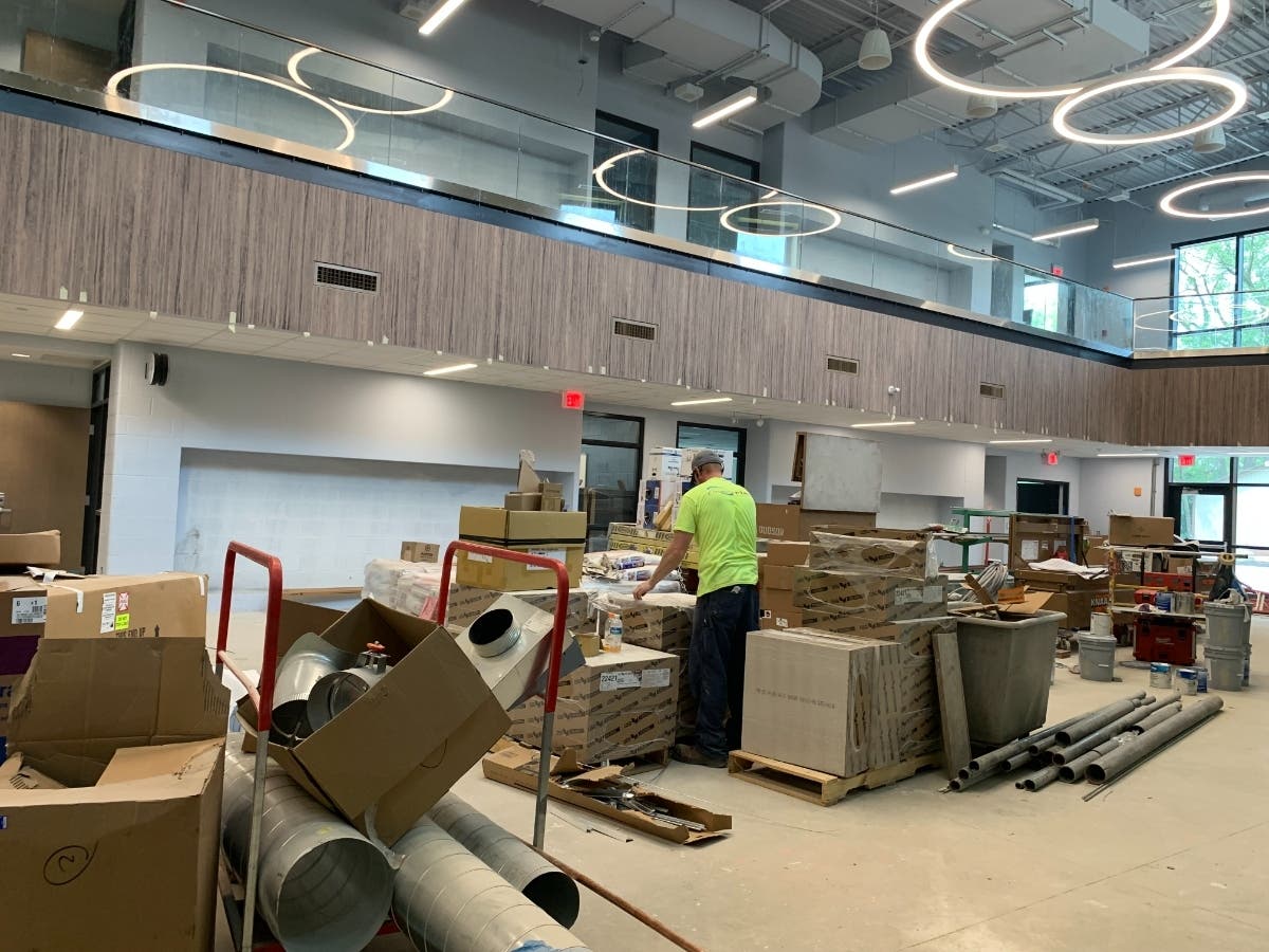 Workers are finishing a classroom addition that connects the elementary and middle schools at La Grange Highlands School District 106. 