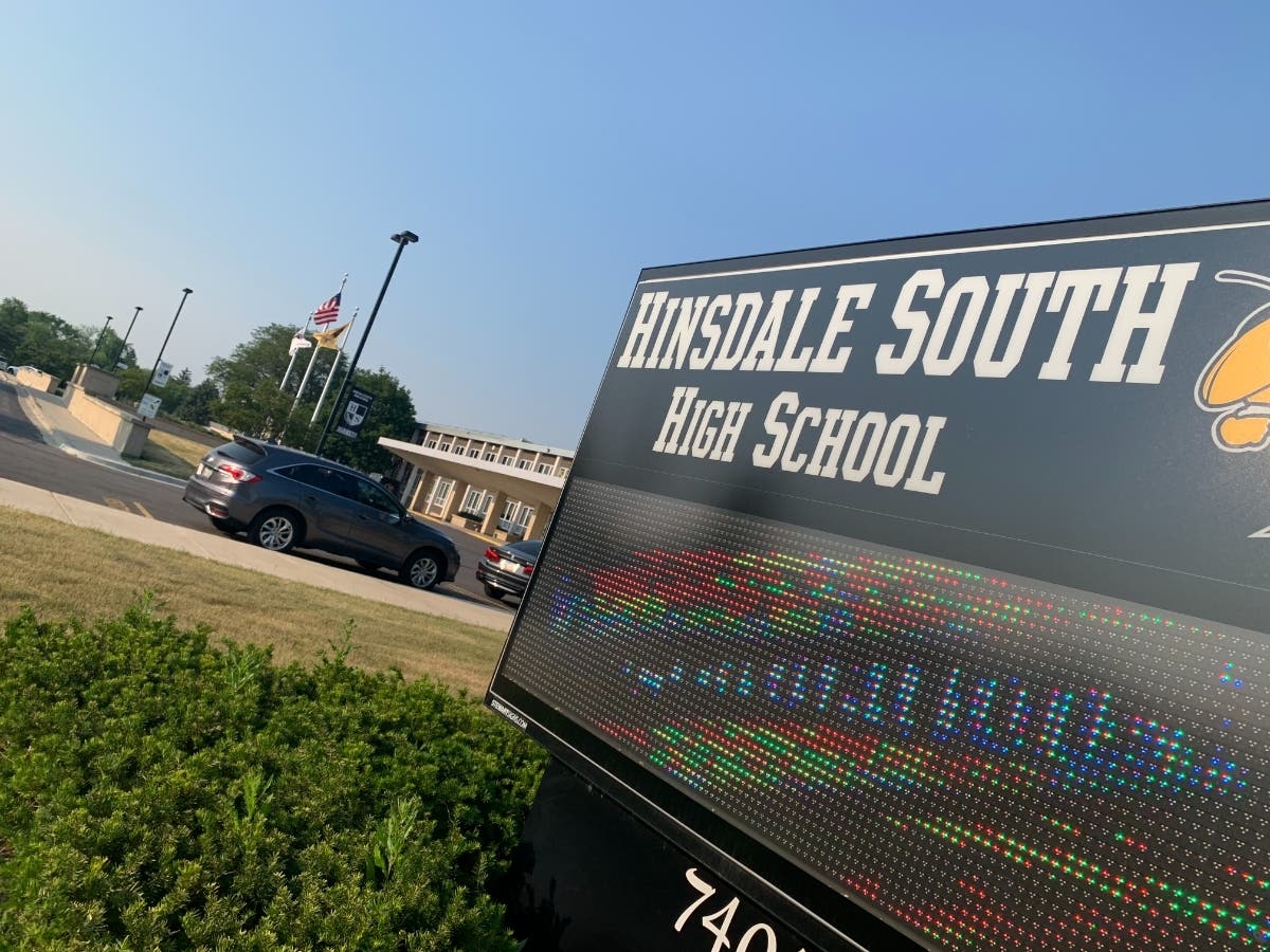 The new surface of the fieldhouse track at Hinsdale South High School lacks traction on the curves, according to the school district. The school board agreed to spend $94,000 to fix it. 