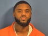 Ditalion Barnett, 27, of Chicago, was arrested on a charge of armed robbery with a firearm, Elmhurst police said.