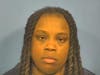 Adyria Moore, 23, of Hillside, was arrested on a charge of armed robbery with a firearm, Elmhurst police said.
