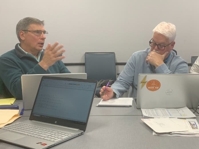 Elmhurst Alderman James Nudera (left) urges the city to "take the Band-Aid off and get to work" on water and sewer projects during a City Council committee meeting on Monday. Next to him is Alderman Rex Irby.