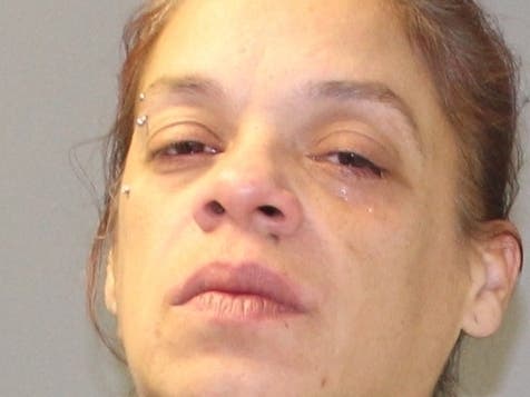 Marie Velez, 40, who lives in an Elmhurst hotel, was charged with aggravated robbery, aggravated battery, theft and contributing to the delinquency of a minor. Two boys were charged with aggravated robbery and aggravated battery. 