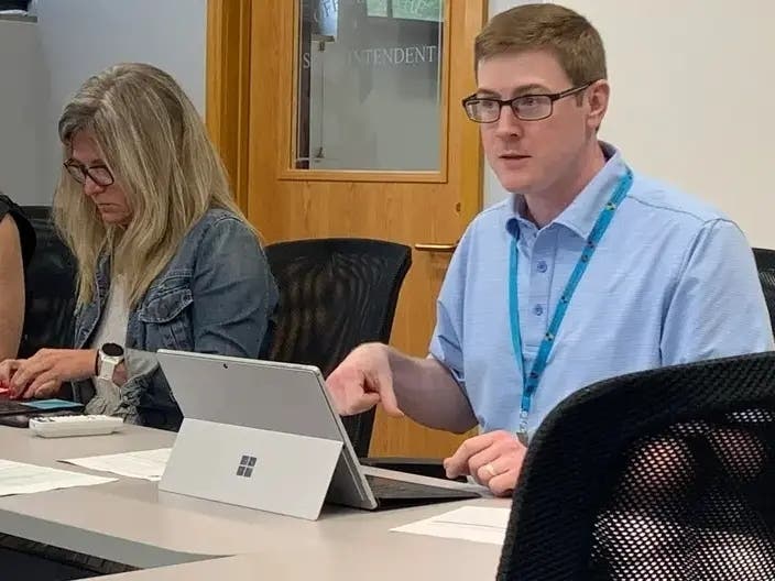 Erik Held was president of the Hinsdale High School District 86 board in 2022 when the attorney general said members violated the open meetings law. Next to him was then-Superintendent Tammy Prentiss.