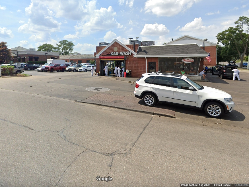 A white SUV can be seen parked in Hinsdale's right of way on the east side of Fuller's Car Wash, 102 Chicago Ave., in this Google Maps photo in August 2022. See below for photos in other years. 
