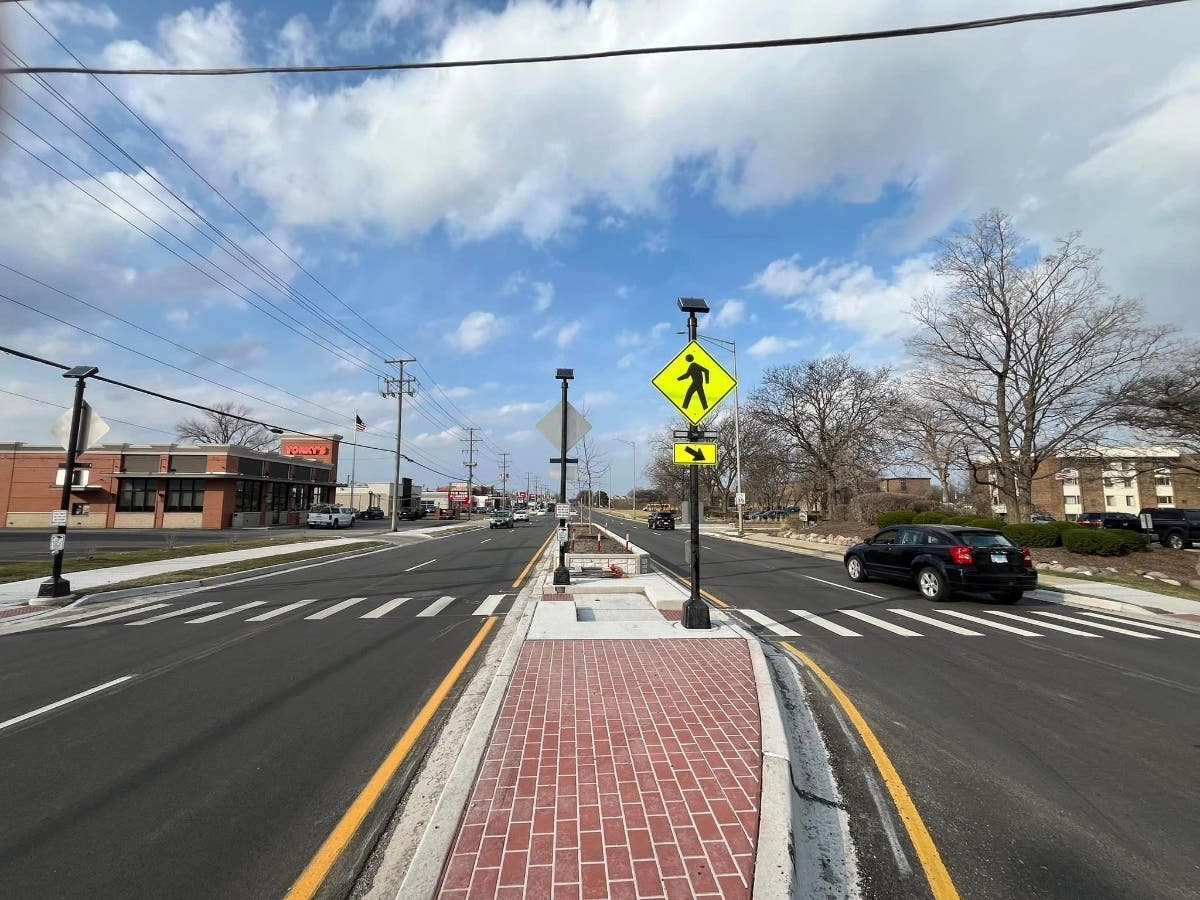 Flashing lights for a dedicated crosswalk started operating Monday near Yorky's restaurant on North York Street. An alderman advised that pedestrians be cautious using it. 