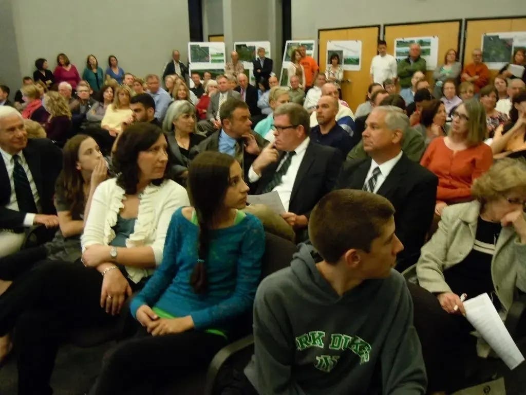 Residents crowded Elmhurst City Hall chambers in May 2013 about their frustrations with recent flooding.Floo
