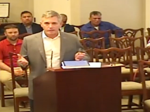 Brian Richards, the father of Sean Patrick Richards, speaks at Tuesday's Hinsdale Village Board meeting. He said his family's goals with its lawsuit against Fuller's Car Wash are truth, accountability and public safety. 