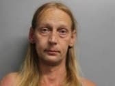 Lelu Reiter, 43, of Chicago Ridge, was arrested on charges of attempted murder, aggravated battery and criminal property damage. 