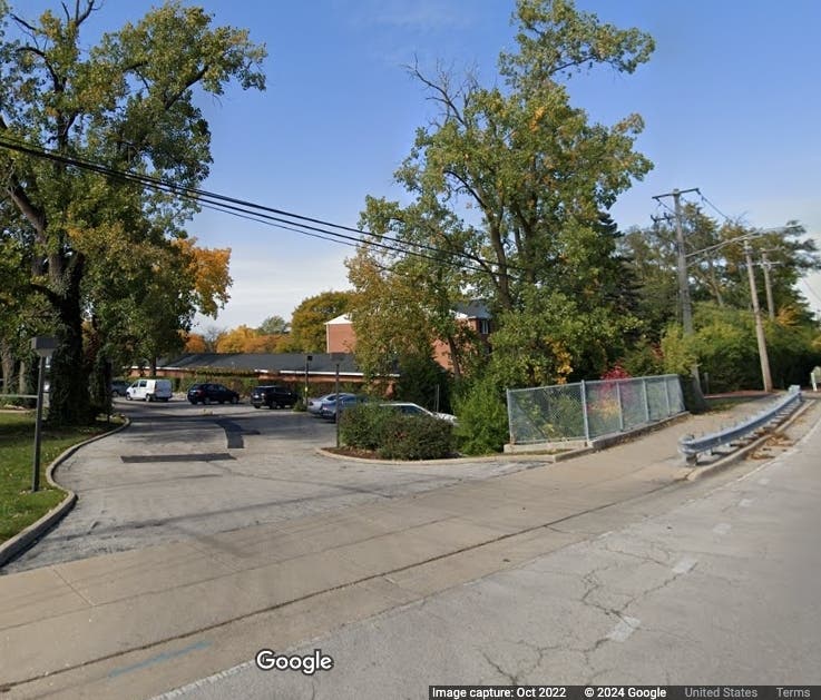 Under a developer's plan, an office complex at 5600 Wolf Road would be torn down and replaced with a townhome development.
