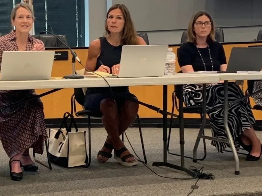 Alderwomen Tina Park (second from left) said Friday she won't run for another term next year. Next to her in this meeting earlier this year are Alderwoman Marti Deuter (left) and Eileen Franz, the city's planner. 