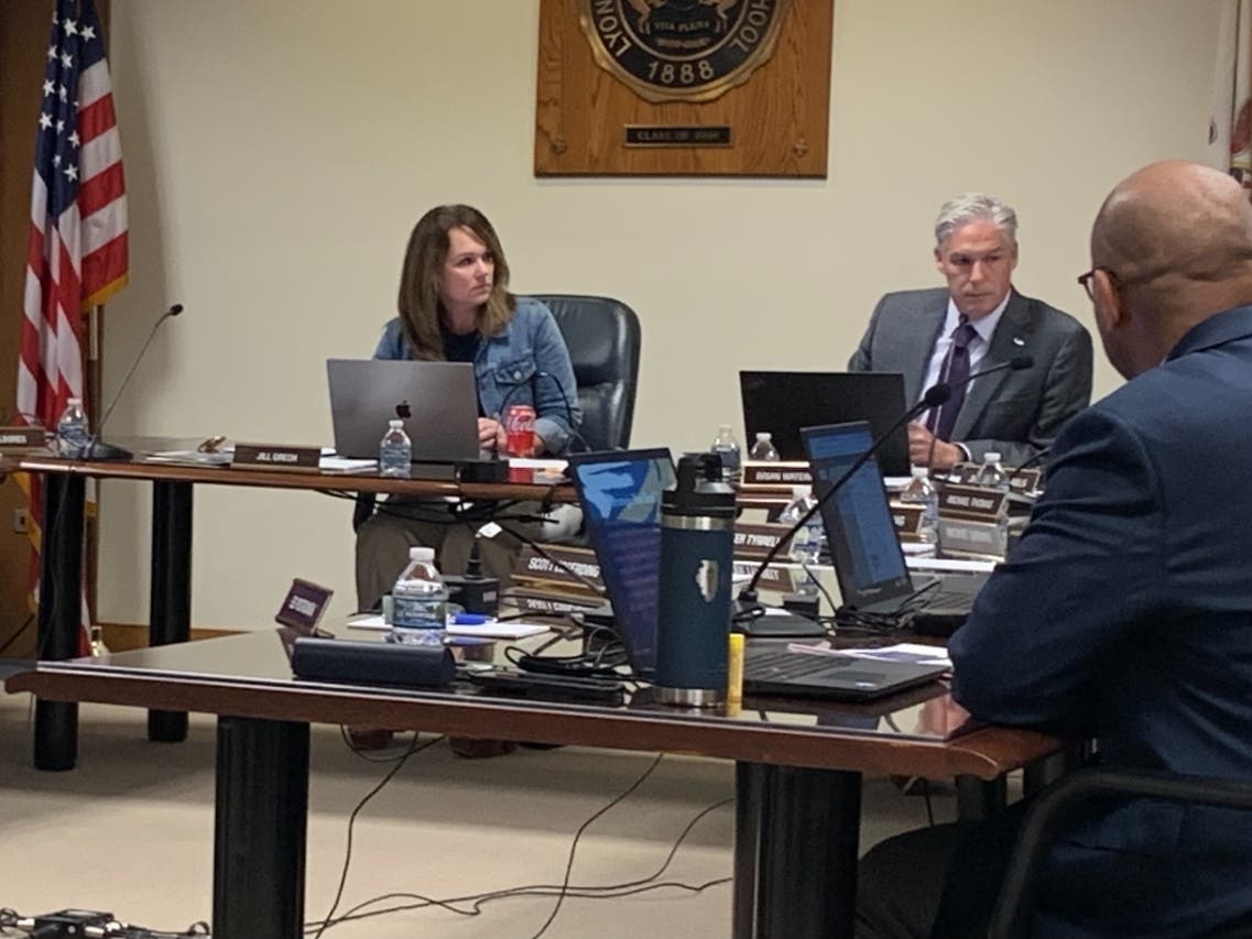 Jill Grech, president of the Lyons Township High School board, spoke to members Monday about the Willow Springs land issue. Next to her is Superintendent Brian Waterman. 
